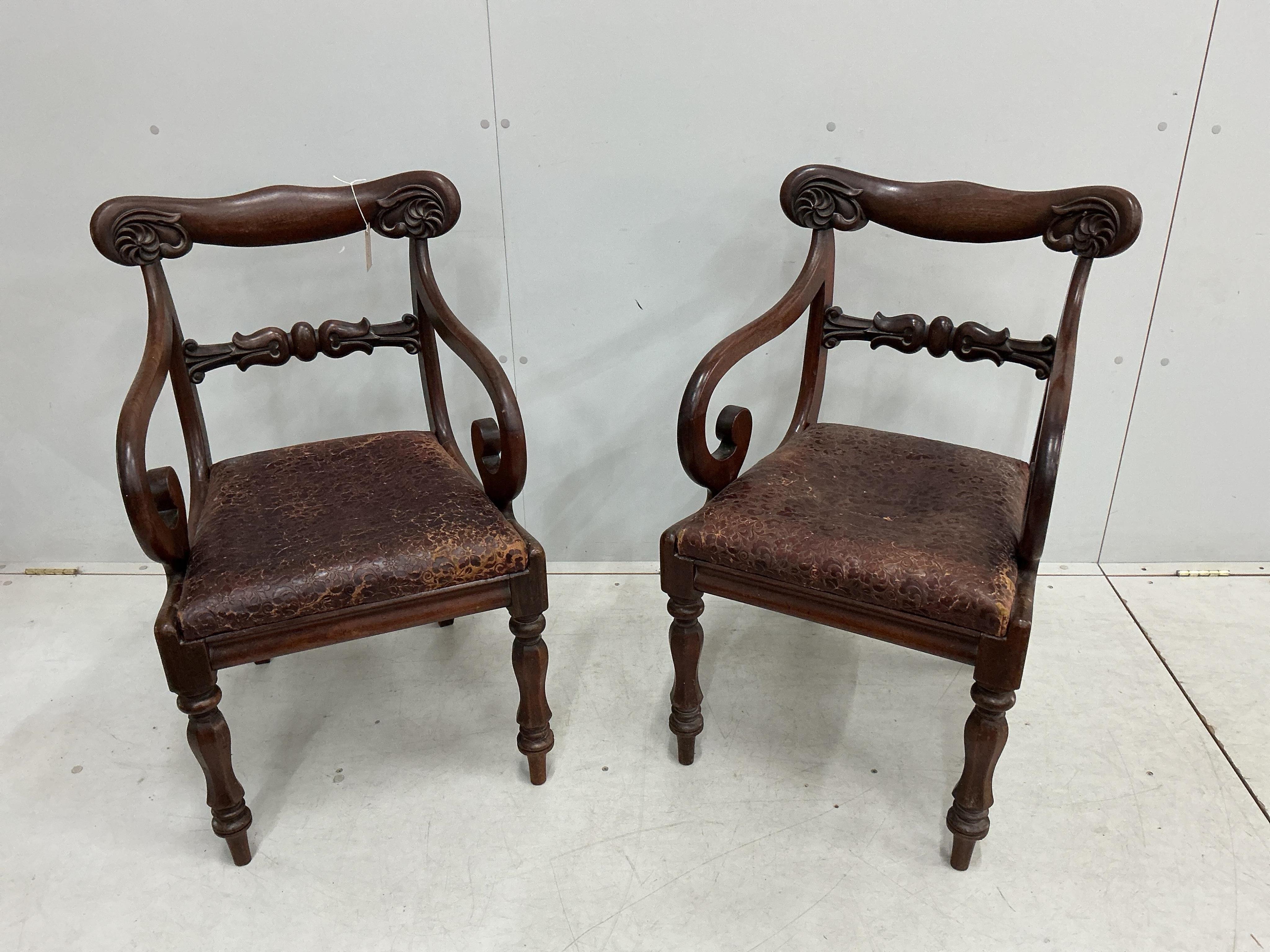 A pair of William IV mahogany elbow chairs, width 53cm, depth 46cm, height 87cm